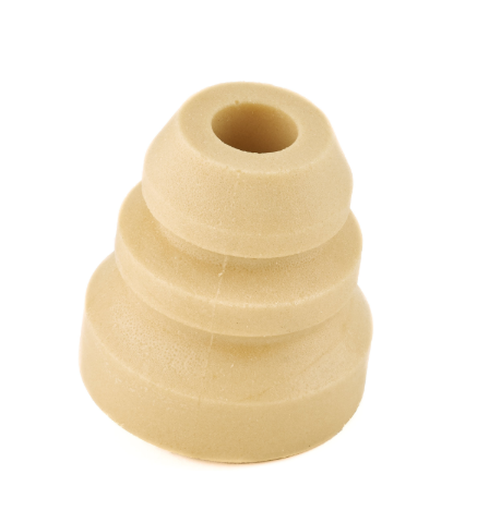 Beige, multi-layered foam object with a central hole.