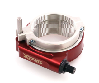 Red anodized XTRIG clamp device with threaded inner ring and black adjustment knob, a bicycle component for securing a tube.