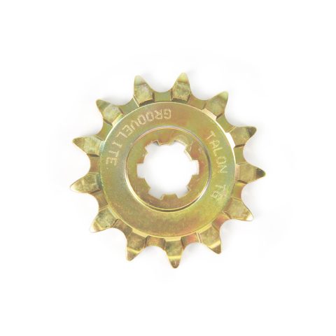 Gold metal sprocket gear with inner splined hole, isolated on white background.