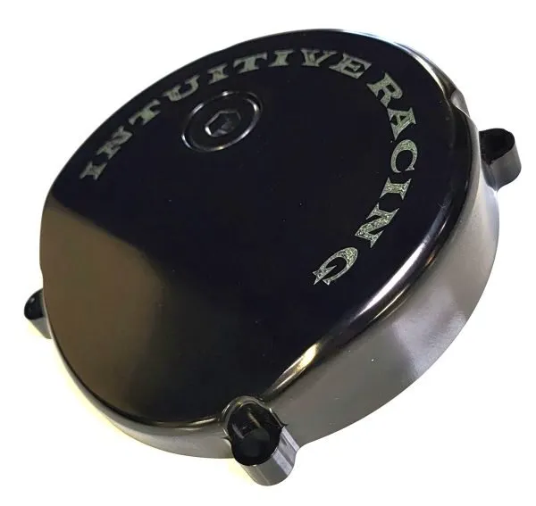 Cover-2024-3-600x567 - Inmotion Suspension Round black, oval-shaped racing fuel cap with four mounting lugs and 'Authentive Racing' lettering around the edge.