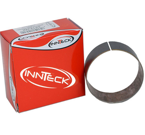 Red INNTECK box next to a circular abrasive belt ring with a split, on a white background