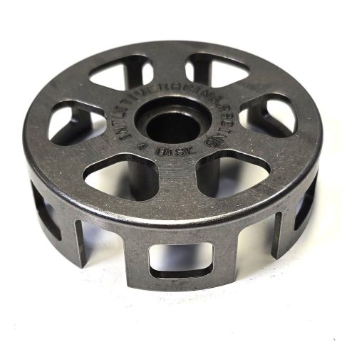 Metal circular spool with six oval cutouts and a central bore, a mechanical component.