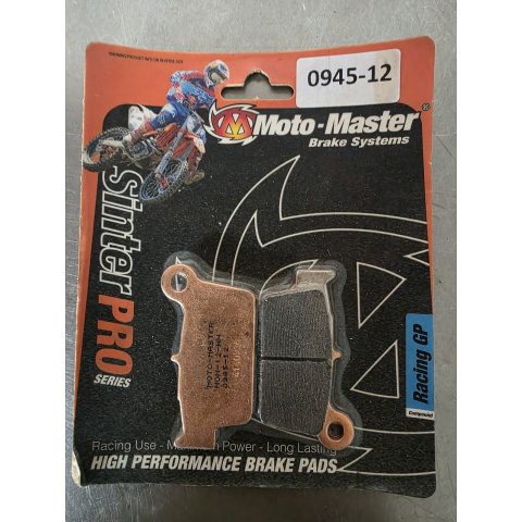 Moto-Master brake pads packaging with a motocross rider graphic on an orange/black card