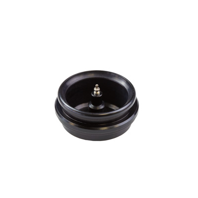 Black circular mechanical component with an inner cavity and a central metal screw-like spindle.